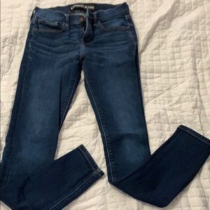 Express dark wash skinny jeans